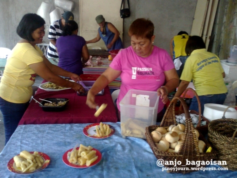 Cooks preparing food for visitors at the Robredo house in Naga Shot August 20, 2012 by Anjo Bagaoisan
